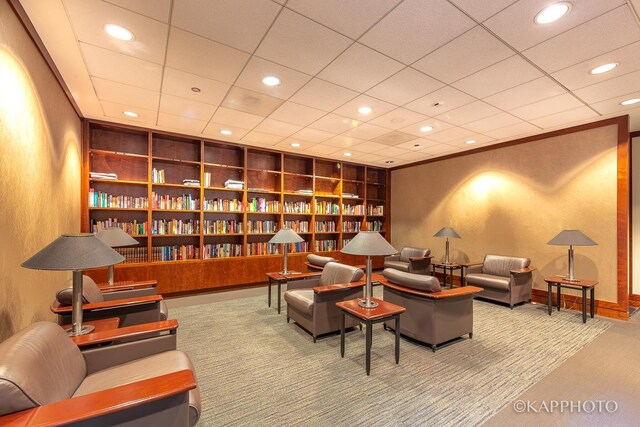 222 N Columbus Dr Unit 2808, Chicago, IL 60601 - sitting room featuring carpet floors, built in shelves, recessed lighting, baseboards, and a textured wall