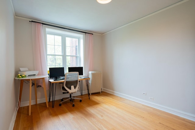 6652 N Glenwood Ave Unit 3N, Chicago, IL 60626 - office with radiator, wood finished floors, crown molding, and baseboards