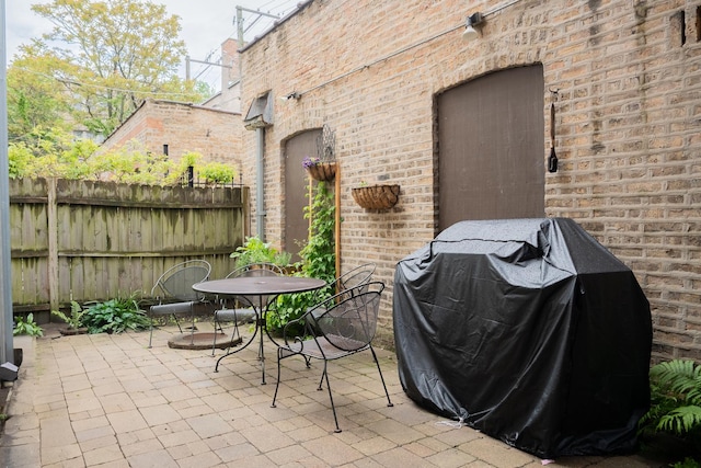 6652 N Glenwood Ave Unit 3N, Chicago, IL 60626 - view of patio / terrace featuring a grill and outdoor dining area