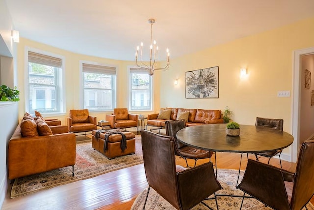 6652 N Glenwood Ave Unit 3N, Chicago, IL 60626 - dining space with wood finished floors and a chandelier