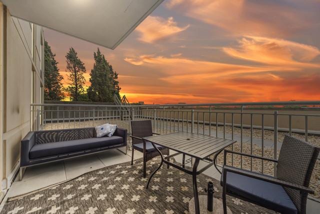 1640 Maple Ave Unit 505, Evanston, IL 60201 - balcony at dusk featuring a patio area