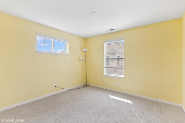 14 E Moseley Rd, Palatine, IL 60074 - spare room featuring baseboards and carpet