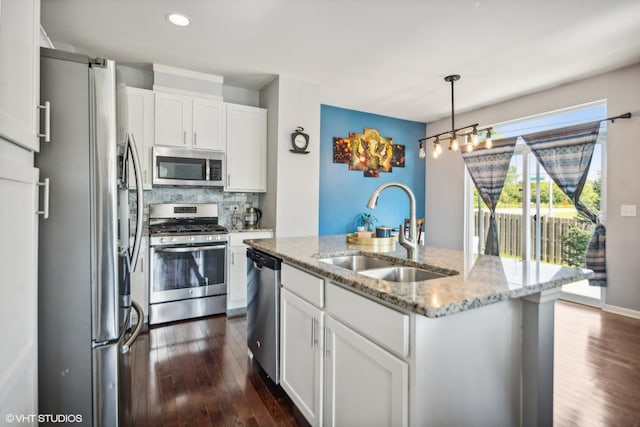 14 E Moseley Rd, Palatine, IL 60074 - kitchen featuring stainless steel appliances, a sink, white cabinets, backsplash, and dark wood-style flooring