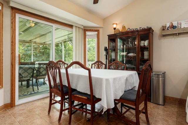 694 Lake Summerset Rd, Davis, IL 61019 - dining area featuring ceiling fan, baseboards, and light tile patterned floors
