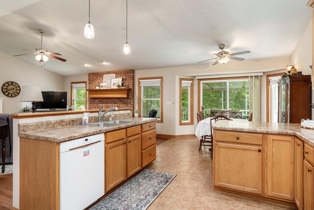 694 Lake Summerset Rd, Davis, IL 61019 - kitchen with white dishwasher, a sink, ceiling fan, pendant lighting, and vaulted ceiling
