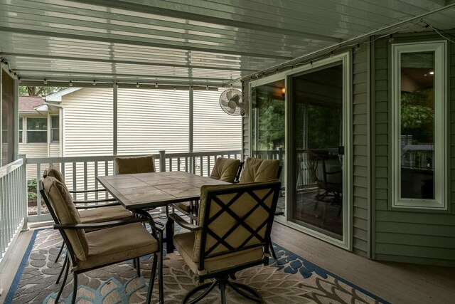 694 Lake Summerset Rd, Davis, IL 61019 - sunroom featuring outdoor dining area and healthy amount of natural light