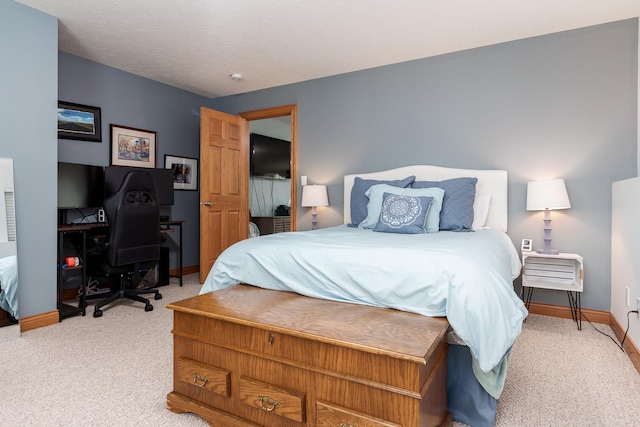 694 Lake Summerset Rd, Davis, IL 61019 - bedroom featuring light carpet, baseboards, and an office area