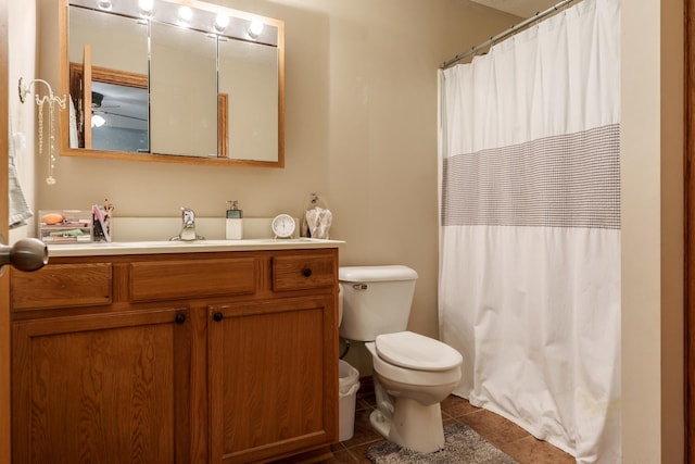 694 Lake Summerset Rd, Davis, IL 61019 - full bathroom featuring toilet, vanity, tile patterned floors, and a shower with curtain