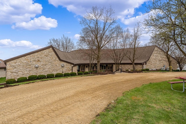 694 Lake Summerset Rd, Davis, IL 61019 - view of front of home featuring stone siding and a front yard
