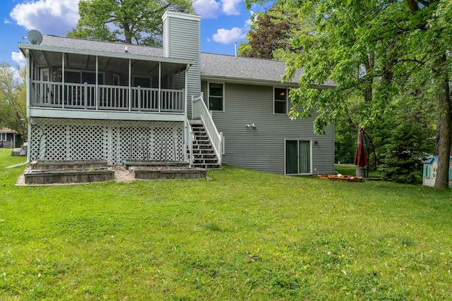 694 Lake Summerset Rd, Davis, IL 61019 - back of house with a sunroom, stairway, a shingled roof, a chimney, and a yard