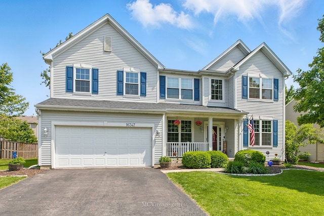 16347 W Cagwin Dr, Lockport, IL 60441 - view of front of house with a porch, driveway, and a garage