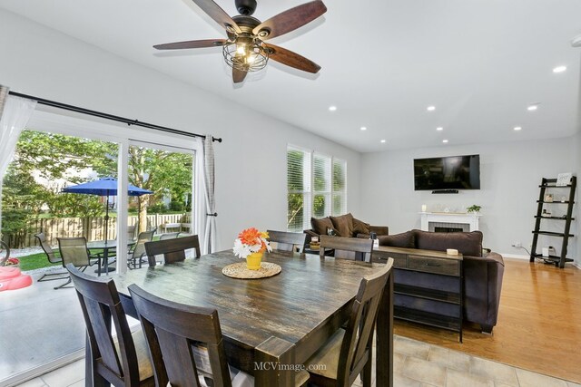 16347 W Cagwin Dr, Lockport, IL 60441 - dining space featuring ceiling fan, recessed lighting, and a fireplace
