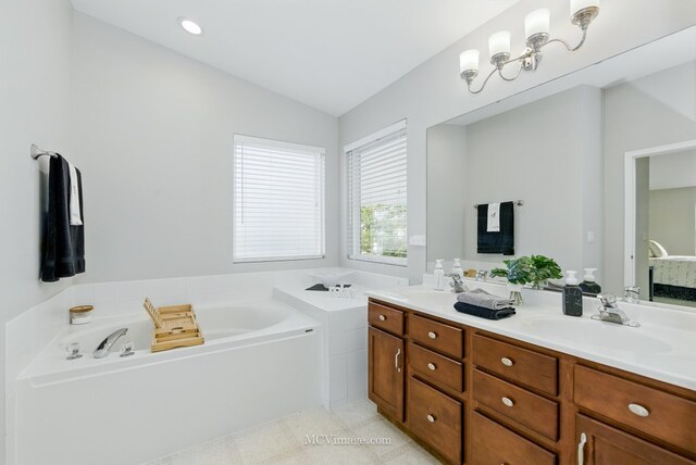 16347 W Cagwin Dr, Lockport, IL 60441 - bathroom featuring vaulted ceiling, double vanity, a bath, and tile patterned floors