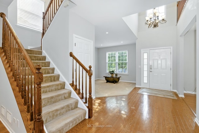 16347 W Cagwin Dr, Lockport, IL 60441 - foyer entrance with a chandelier, light wood finished floors, stairs, and recessed lighting
