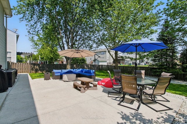 16347 W Cagwin Dr, Lockport, IL 60441 - fenced backyard featuring an outdoor hangout area, outdoor dining area, and a patio