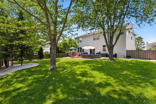 16347 W Cagwin Dr, Lockport, IL 60441 - fenced backyard featuring a patio