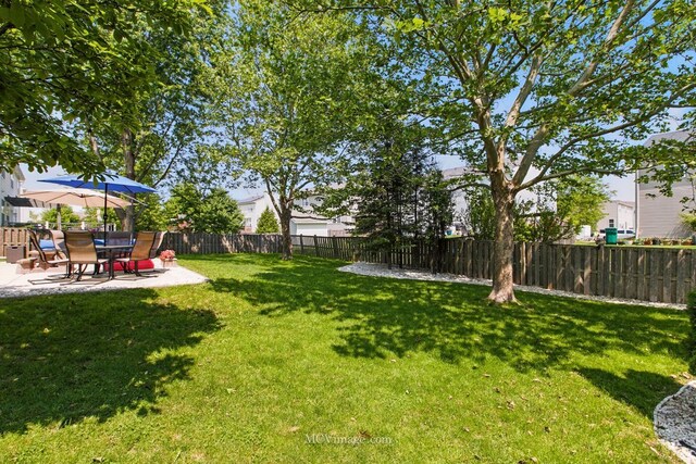 16347 W Cagwin Dr, Lockport, IL 60441 - fenced backyard featuring a patio