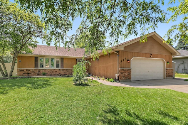 single story home featuring brick siding, a garage, a front yard, and concrete driveway