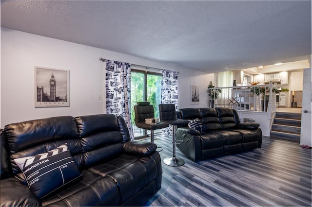 3142 Monterey Dr, Flossmoor, IL 60422 - living room featuring a textured ceiling and dark wood-style flooring