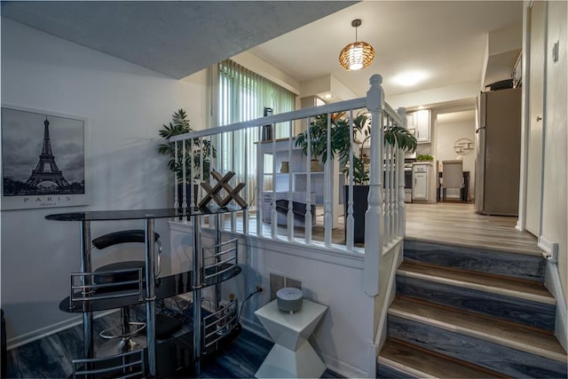 3142 Monterey Dr, Flossmoor, IL 60422 - stairs with wood finished floors and decorative columns