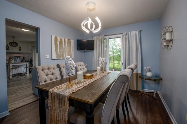 3142 Monterey Dr, Flossmoor, IL 60422 - dining space featuring wood finished floors, baseboards, and a chandelier