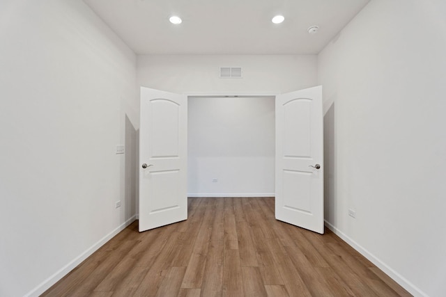 3214 Lincoln Prairie Blvd, Aurora, IL 60503 - unfurnished bedroom featuring wood finished floors, recessed lighting, and baseboards