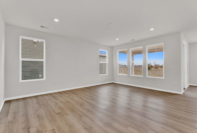 3214 Lincoln Prairie Blvd, Aurora, IL 60503 - empty room with wood finished floors, recessed lighting, and baseboards