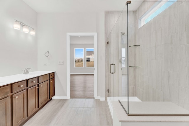 3214 Lincoln Prairie Blvd, Aurora, IL 60503 - bathroom with a stall shower, vanity, baseboards, and tile patterned flooring