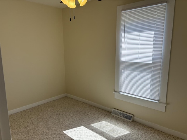 112 W 6th St, Gridley, IL 61744 - carpeted empty room featuring ceiling fan and plenty of natural light