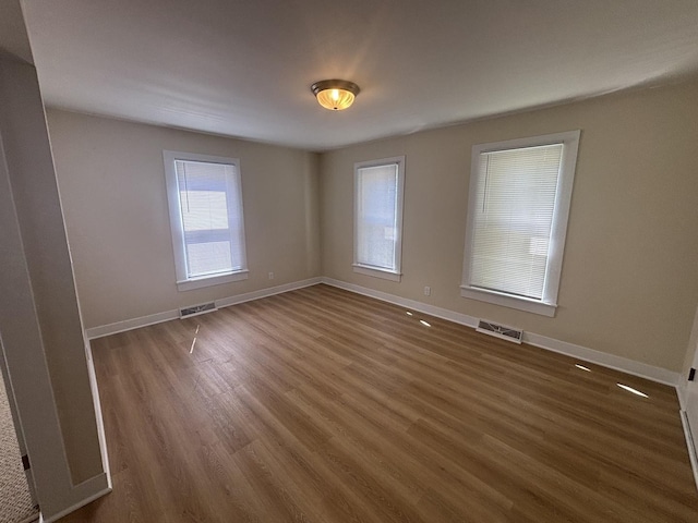 112 W 6th St, Gridley, IL 61744 - unfurnished room featuring wood finished floors and baseboards