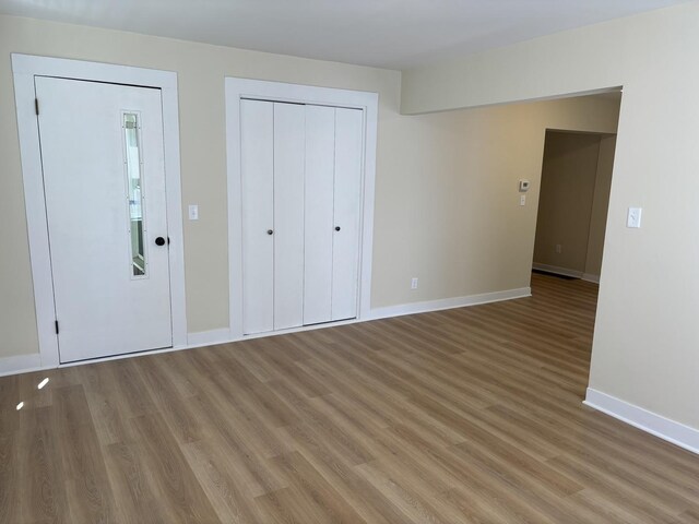 112 W 6th St, Gridley, IL 61744 - unfurnished room with baseboards and wood finished floors