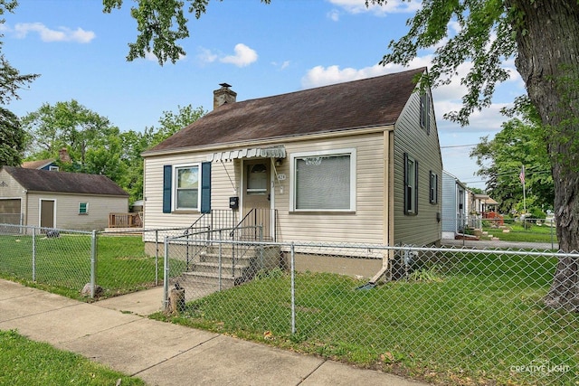 424 Howard Ave, Aurora, IL 60506 - view of front of house with a chimney