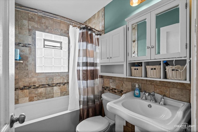 424 Howard Ave, Aurora, IL 60506 - full bath with tile walls, toilet, a sink, and shower / bath combo
