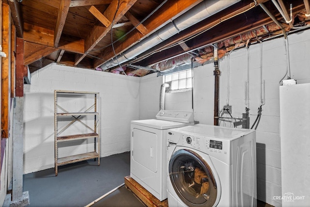 424 Howard Ave, Aurora, IL 60506 - washroom with washer and clothes dryer and concrete block wall