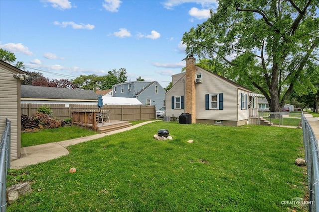 424 Howard Ave, Aurora, IL 60506 - back of house with a deck and a chimney