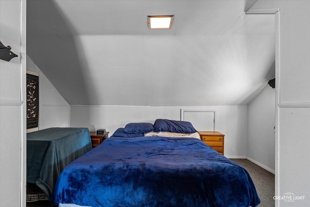 424 Howard Ave, Aurora, IL 60506 - carpeted bedroom featuring vaulted ceiling and baseboards
