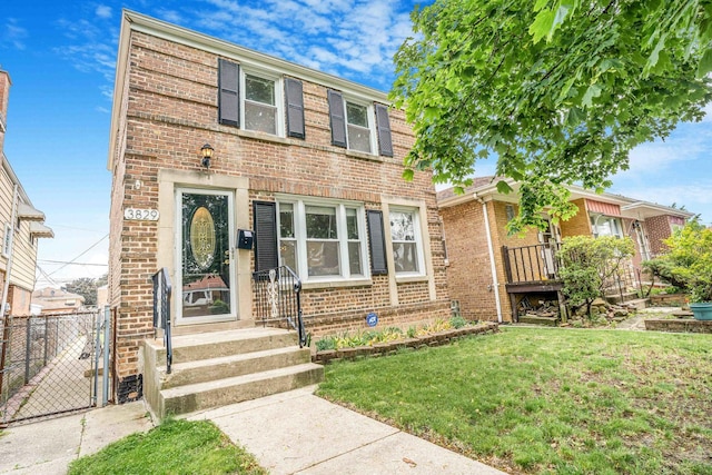 3829 S Austin Blvd, Cicero, IL 60804 - view of front of home featuring brick siding and a gate