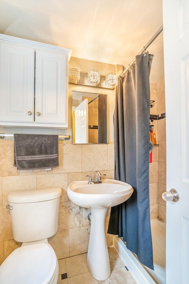 3829 S Austin Blvd, Cicero, IL 60804 - full bathroom with toilet, a stall shower, and tile walls