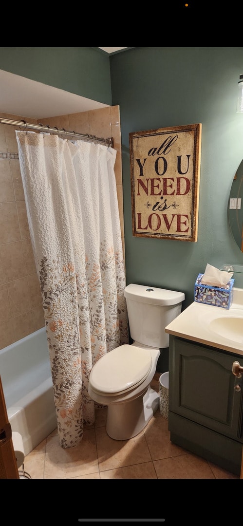 3300 N Carriageway Dr Unit 209, Arlington Heights, IL 60004 - full bathroom featuring tile patterned floors, vanity, toilet, and shower / bath combination with curtain