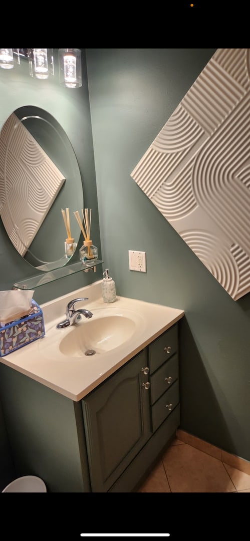 3300 N Carriageway Dr Unit 209, Arlington Heights, IL 60004 - bathroom featuring tile patterned flooring and vanity