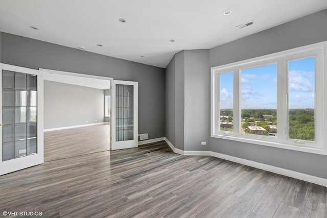 1 Renaissance Pl Unit 3Ph, Palatine, IL 60067 - spare room with wood finished floors, french doors, and recessed lighting