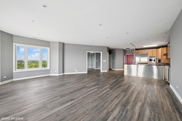 1 Renaissance Pl Unit 3Ph, Palatine, IL 60067 - unfurnished living room with baseboards and dark wood-style flooring