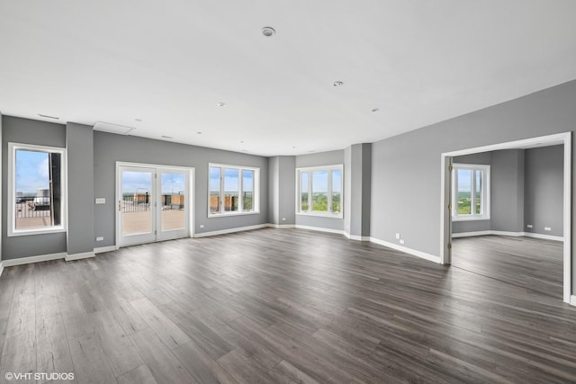 1 Renaissance Pl Unit 3Ph, Palatine, IL 60067 - unfurnished living room featuring healthy amount of natural light and dark wood-style floors