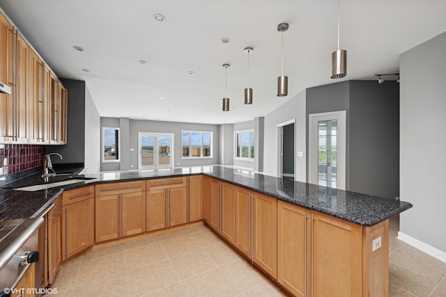 1 Renaissance Pl Unit 3Ph, Palatine, IL 60067 - kitchen featuring light tile patterned floors, pendant lighting, decorative backsplash, recessed lighting, and dark stone counters