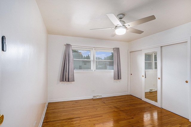 12101 S Lafayette Ave, Chicago, IL 60628 - unfurnished room with ceiling fan, light wood-type flooring, and baseboards