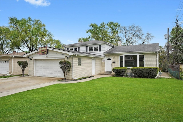 1933 Birch St, Des Plaines, IL 60016 - split level home featuring an attached garage, a front lawn, brick siding, and concrete driveway