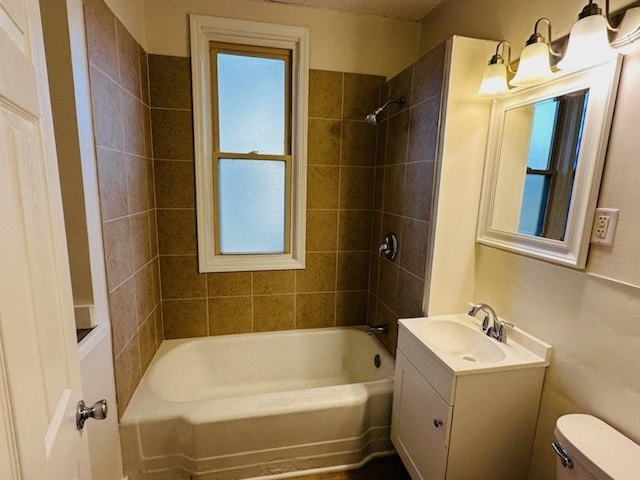 464 S Harrison Ave, Kankakee, IL 60901 - full bath with toilet, vanity, and washtub / shower combination