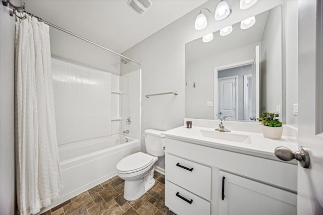 3808 Honeysuckle Ln, Elgin, IL 60124 - bathroom with toilet, vanity, shower / bathtub combination with curtain, and stone finish flooring