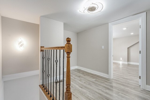 12533 S Lowe Ave, Chicago, IL 60628 - corridor with an upstairs landing, light wood-style flooring, and baseboards
