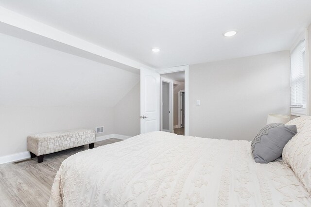 12533 S Lowe Ave, Chicago, IL 60628 - bedroom with wood finished floors, baseboards, and recessed lighting